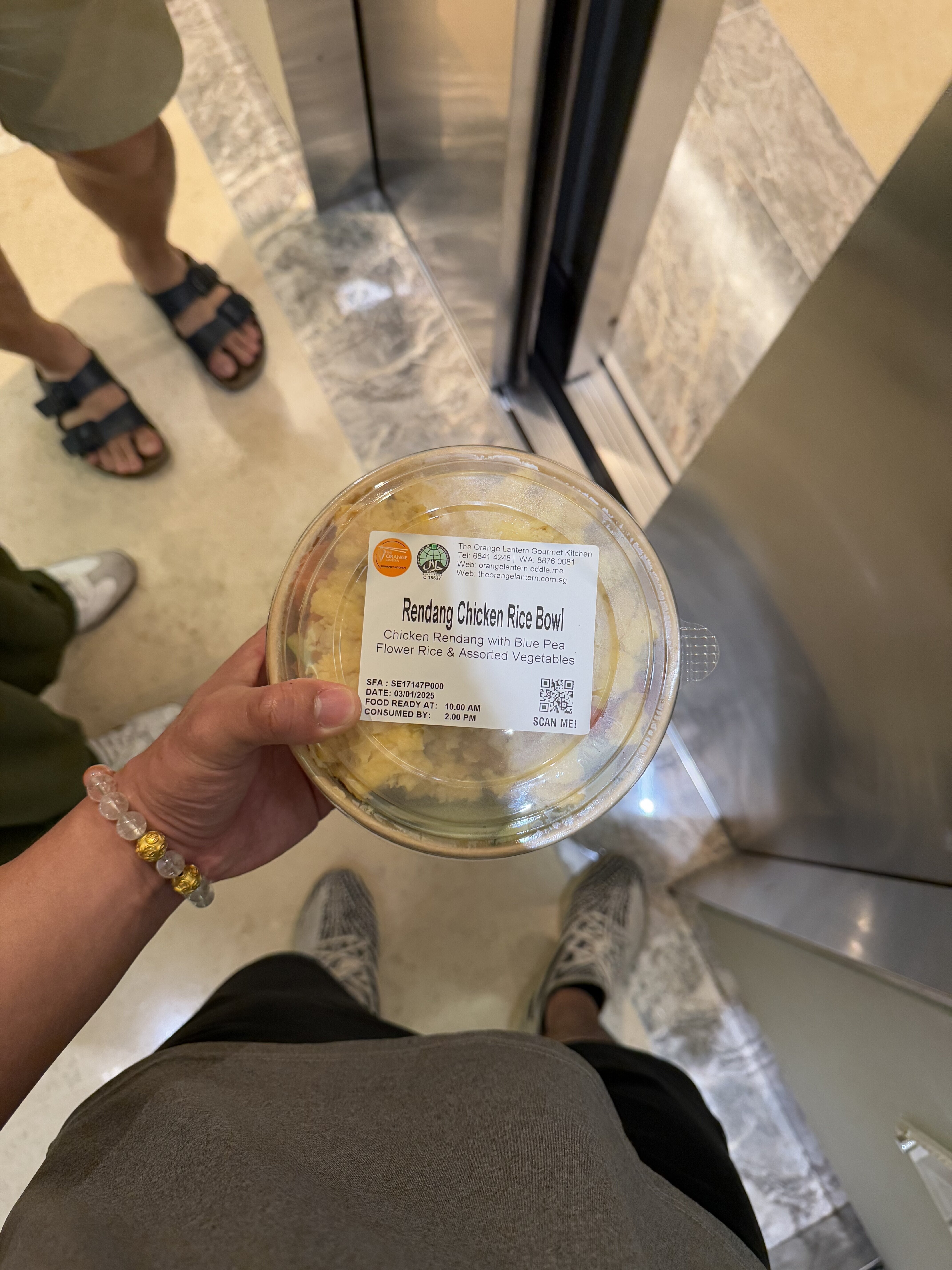 rendang chicken bowl saved for dinner, topped with steamed/fried eggs-yum!